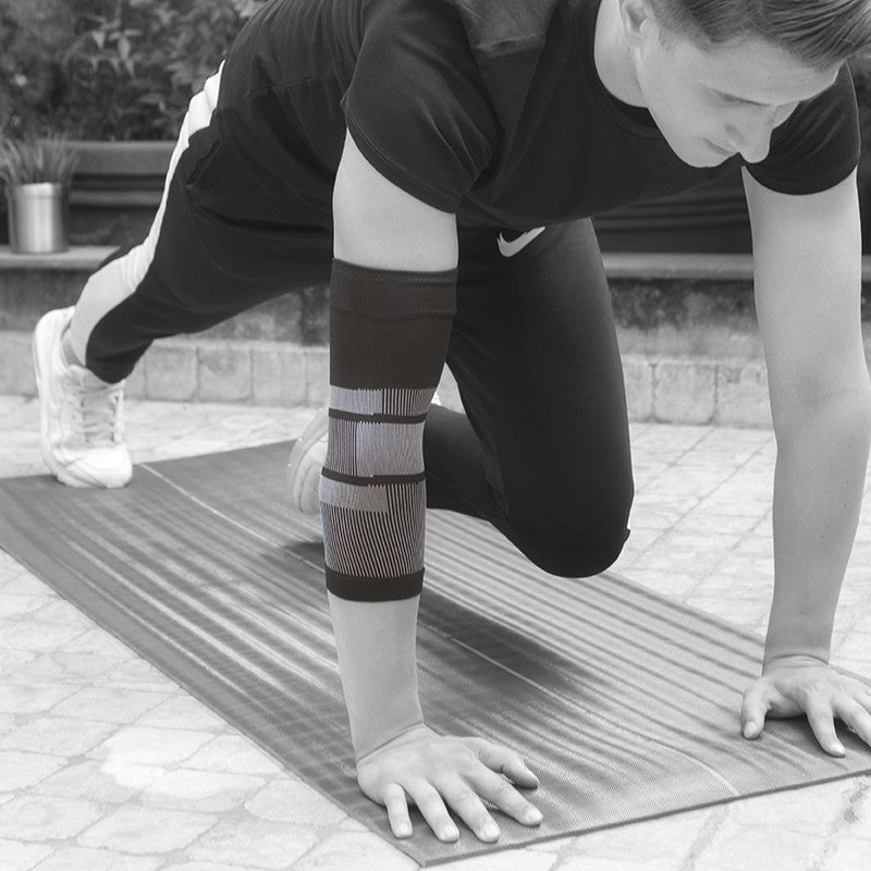 Orthoself elbow support with light compression and support