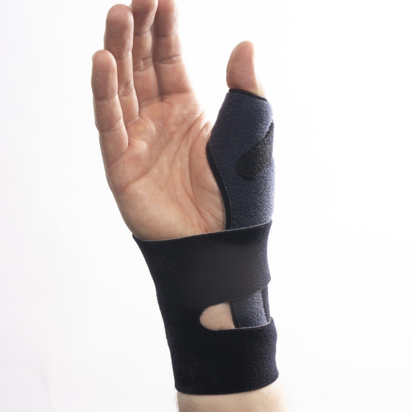 Handledsstöd med integrerat tumstöd för senskideinflammation och De Quervains syndrom